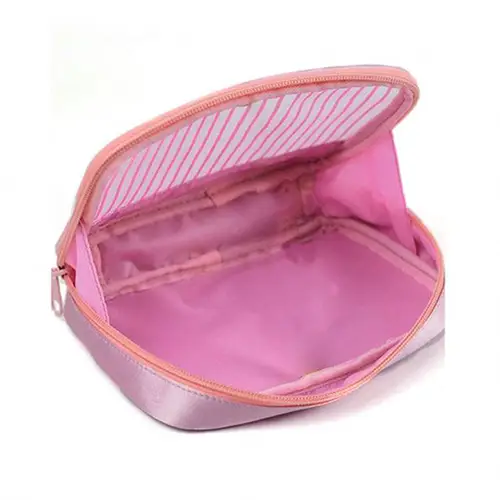 Close-up of high-density anti-fray mesh material paired with premium eco-friendly vegan leather trim on a custom makeup pouch